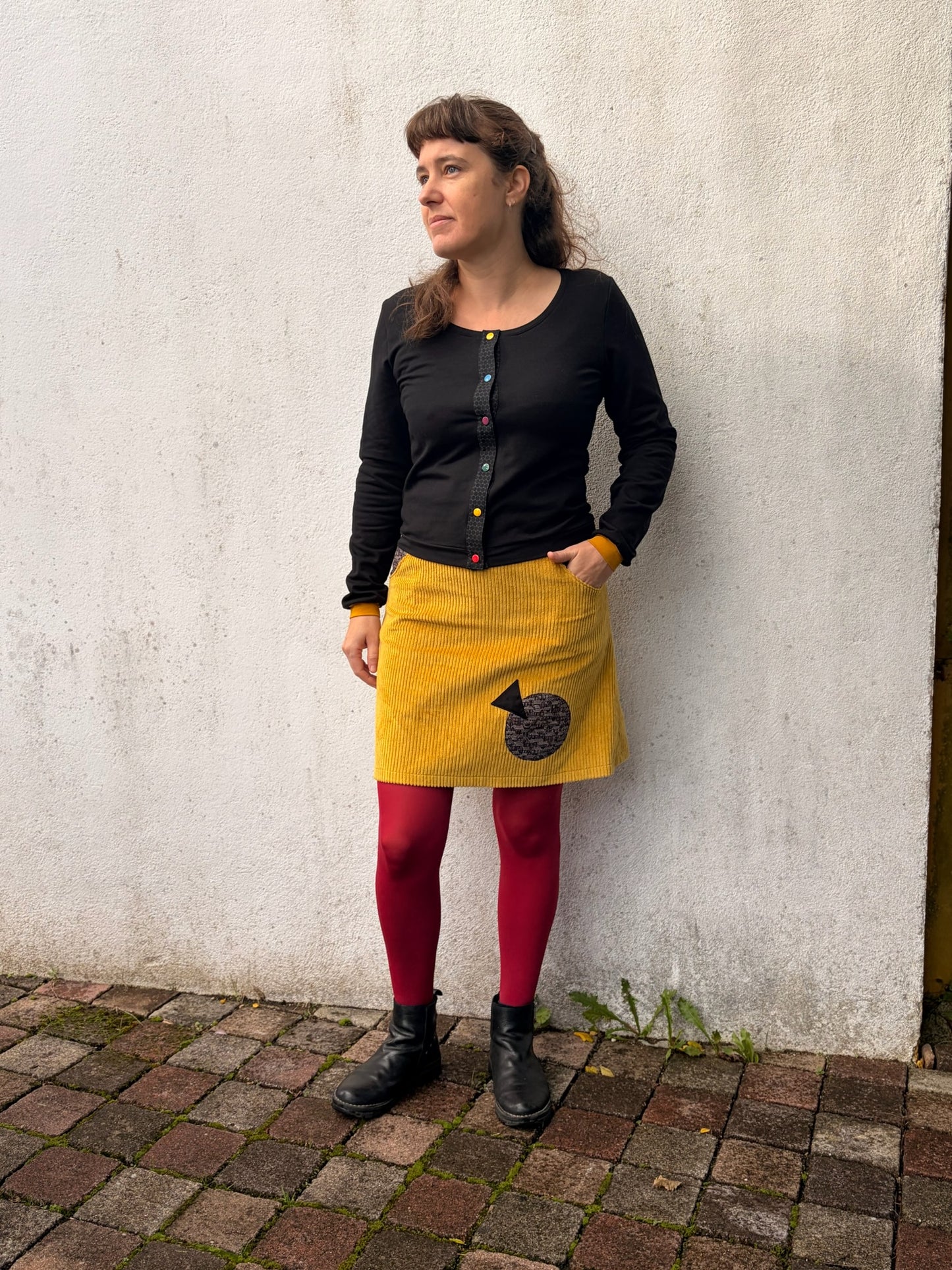 Gilet en french terry noir, boutons multicolores