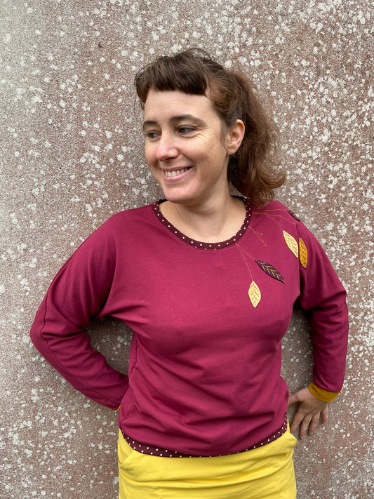 Sweat chauve-souris bordeaux et jaune à feuillages